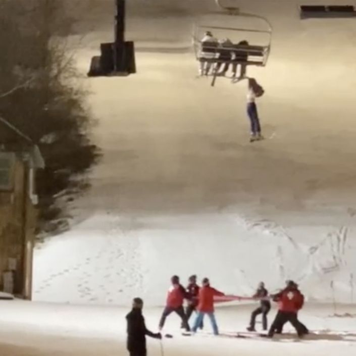 Skier rescued after dangling from chairlift in harrowing video