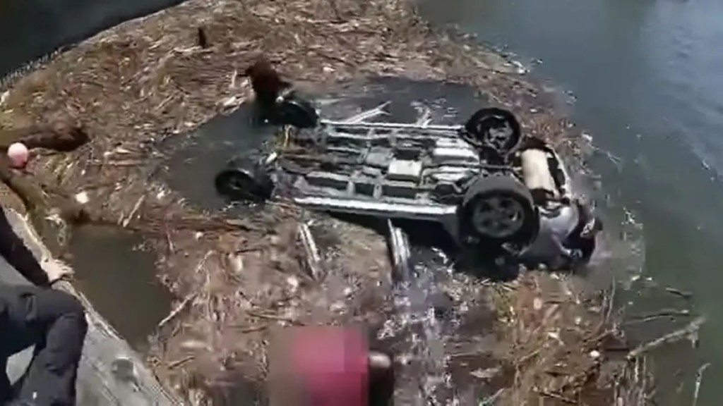 New Jersey police rescue woman from SUV submerged in Delaware River